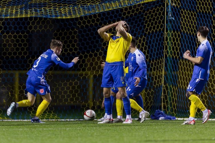Rhys Abruzzesse celebrates his stoppage time equaliser for Haverfordwest County at Barry Town United